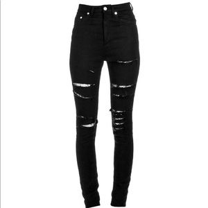 Saint Laurent Distressed Jeans with Lace insert